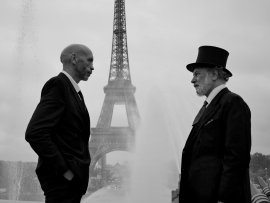 Rencontre surréaliste avec Gustave Eiffel en haut de sa Tour